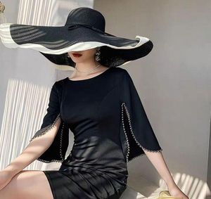 Geniş Kötü Şapkalar Tasarımcı Bayanlar Büyük Plajı Şapka Kadın Disket Saman Güneş Soğutma UV Koruma Bütün Dropshipon S12035235577