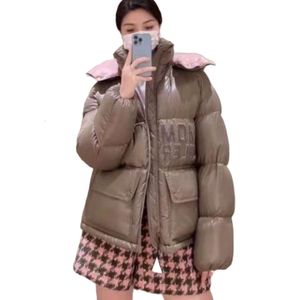 MONCLAIR 디자이너 복자 재킷 최고 품질 디자이너 Monclair Puffer Jacket Top Quality Women 's Down Parkas 마스크 자수와 대형 포켓 Zipper