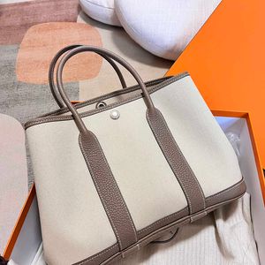 Hremmss Party Garden Designer Shoulder bags online shop Handmade wax bucket bag color blocking canvas garden genuine leather womens tote Have Real Logo