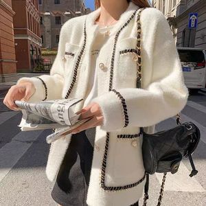 Kvinnor jackor vit mink kashmir tröja kappa kvinnor lat stil koreansk retro svart lös o nackstickad cardigan mode pärla spänne 231214