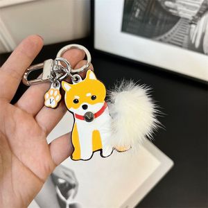 Hundnyckelkedjor Luxury Desginers Keyrings Lovers väska tecknad accessoarer Bilknapphållare för män kvinnor gåva