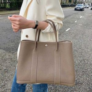 Top original wholesale Hremmss Party Garden tote bags online shop bag feeling for women's 2023 new high capacity commuting casual shoulder With Real Logo