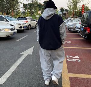 Tute da uomo Pantaloni sportivi hip-hop grigio chiaro e pantaloni sportivi invernali americani larghi in pile