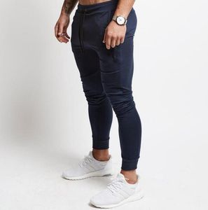 Mager fitness träning byxor muskler tränar män byxor sport joggar dragböjder byxor hip hop streetwear casual utomhus tröja gym mäns blyertsbyxor 3xl