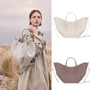 10a Cyme Cowhide Tote-翼のあるデザインバケットフレンチエレガンス：デュアルキャリングオプションGeunine Leather Designer Handbag大規模ショッピングソフトホーボークロスバッグ