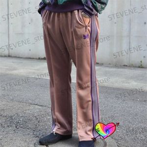 Мужские брюки 2023 BOOT-CUT Needles Track Pants Мужчины Женщины Высококачественные брюки из полиэстера с гладкими иглами Трикотажные брюки в фиолетовую полоску с бабочкой T231214