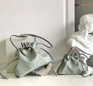 Projektant ramię miękki damski torebka torebka krzyżowa skórzana torebka torebki magnetyczne sznurka sznurka ceramiczna wiszące ornament