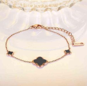 Korean Version of 18k Rose Gold Fourleaf Clover Bracelet for Girls Black Epoxy Titanium Steel Jewelry7410569