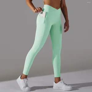 Calças ativas hip levantamento esportes leggings feminino sólido nu cruz cintura bolso yoga alta elástica fitness colheita collants