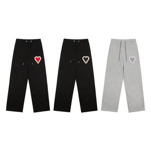 Calças de grife amor coração jacquard logotipo casual simples solto calças retas homens e mulheres com o mesmo moletom de algodão