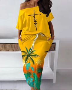 エスニック服の夏エレガントなアフリカンレディースハーフスリーブポリエステルプリント2ピーストップロングスリーブアフリカンレディースセット231214