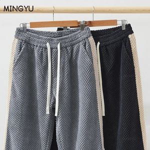 Męskie spodnie tkaniny wzór ananasa męskie spodnie sztrutowe grube sznurka elastyczna talia moda luźna szeroka noga Korea Mężczyzna 231214