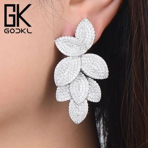 Pieno lampadario Godki Celebrità Favore Foglie di foglie di lusso Foglie Flower Collection Full Micro Cubic Zirconia Orecchie da sposa pavimentata per le donne 231214