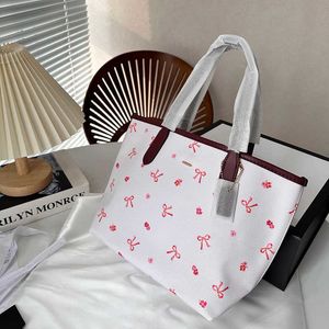 Borsa Di Design Handbags Women Shopping C Designer Tote Bag Brand Snowflake Bow Print Basket Shoulder Bags Large Work Messenger Bag 231215 240209