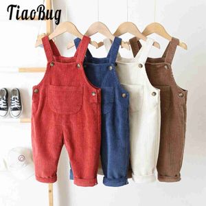 Overaller baby flicka pojkar övergripande corduroy dungarees med knappar sladd hängslen byxor småbarn lösa lång jumpsuit romper casual stylel231129