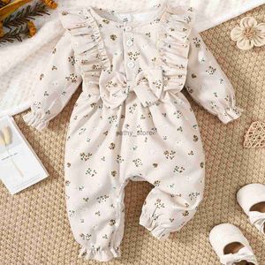 Rompers 3-24 månaders baby flicka långärmad blommig bodysuit vår och höst jumpsuit för småbarn flicka mode ruffle onesie klädsel231114