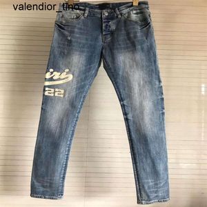 Nuovi pantaloni jeans da uomo 2023 lavaggio strappato marchio di moda dettaglio ginocchio nero lettera ricamo sottile moto uomo donna vintage denim pantaloni jeans