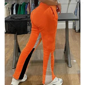 Kvinnors byxor vintage kvinnor lapptäcke hög midja bred ben 2024 streetwear mode klassiska orange jogger byxor svettbyxor