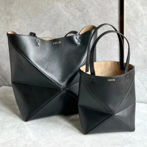Weekender Puzzle Fold Tote Designer Bag Shop Bucket Real Leather Tote 7a Luxurys Handväska axelväska Kvinnors mäns Crossbody 2 storlekar Lady Pochette Clutch Duffle -väskor