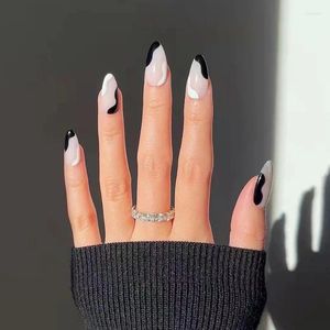 Unghie finte 24 pezzi Moda indossabile Nail Art Nero Bianco Design geometrico Forma a goccia Staccabile Stampa con set di colla