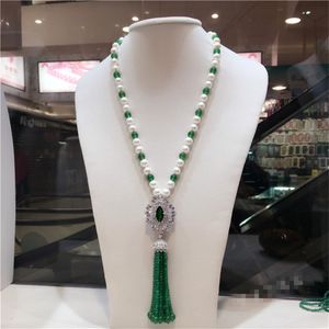 Hand knotted new natural 9-10mm white freshwater pearl inlaid green stone long tassel necklace sweater chain fashion jewelry