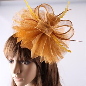 Basker damer eleganta fjäderhattar kvinnor hårtillbehör fancy fascinators för bröllopsfest guld brud och lopp av1522berets b292l