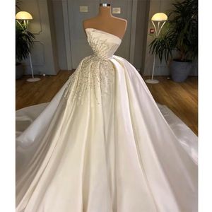 Stunningbride 2024 Weiß Sexy Trägerlose Perlen Kristall Lace Up Ballkleid A-Linie Brautkleid Luxuriöses Ärmelloses Bling Prinzessin Brautkleid Maßgeschneidert