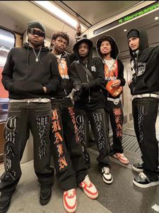 Streetwear kot hip hop mektubu grafik baskı baggy denim pantolon erkekler kadınlar 2023 yeni haruku gündelik punk kaya gevşek pantolon