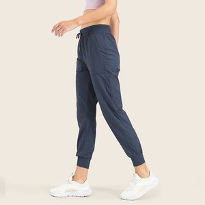 LL Pantaloni sportivi da yoga Corda da disegno femminile Fascio allentato di pantaloni Pantaloni da fitness per il tempo libero a vita alta color pesca