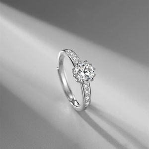 Koreansk version av mode mångsidig S925 Silver Platinum-Plated Imitation Moissan Shiny Flower Ring Micro-Set Multi-Diamonds223N