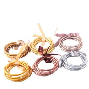 Braccialetti di corsa buddista di colore oro chiaro Braccialetti di tempio del Buddha tibetano Braccialetti di simbolo fortunato Bracciale in silicone per donne Ragazze 5 pezzi lotto 231218