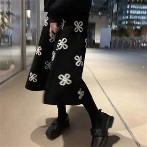 Kjolar kvinnor klöver blommor jacquard stickade kjolar enkla elastiska höga midja långa kjolar höst vinter a-line midi kjolar streetwear 231218