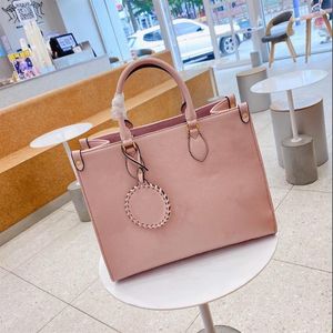 M57639 Designer Top End Women Women Shopping Bag Bag Giant Canvas Flower Flowerized Cowhide Colorful Leather Onthego Purs243J