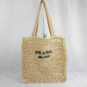 Designer women's handbag Paper rope woven shoulder beach versatile photo taking letter hollowed out bag leisure travel