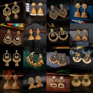 Dungle avizesi bohemia retro altın renkli küpeler alaşım püskül boncuklar pearl çan kulağı çivisi kadınlar için tavus kuşu tarzı hint takı jhumka jhumki 231216