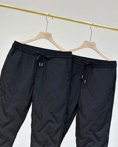 Pra 2023 Pantaloni moda Pantaloni standard in metallo triangolo di cotone piumino di alta qualità da corsa da uomo Protezione impermeabile e anti-neve Regalo di Natale