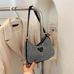 2024 New Designer women's crossbody shoulder Korean version diagonal span bright drill underarm leisure chain dumpling mobile phone bag