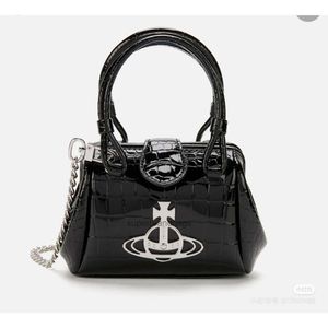 Designers Vivienne Autumn Women's New Western Empress Dowager Saturn Logo Single Shoulder Crossbody CLIP MINI CROCODILE Mönster Små avfallsväska