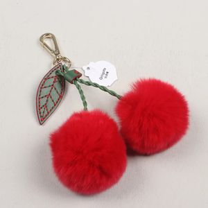 Key Rings Creatve top quality cherry and leaves red real rex rabbit fur key chain cute cherry pom fur handbag decorative pendant 231218