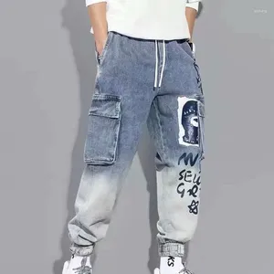 Jeans da uomo Autunno e inverno Marchio di moda Abbigliamento da lavoro Denim Graffiti High Street Pantaloni casual Harlan larghi e versatili