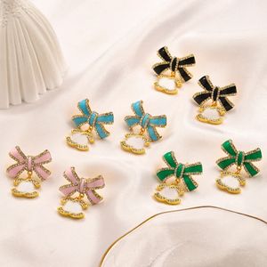 Designers de marca de luxo letras duplas parafuso prisioneiro 18k banhado a ouro 925 prata colorido bowknot eardrop brincos feminino brinco de cristal festa de casamento jewerlry selo de aço