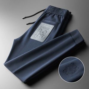 Yoga Męskie spodnie Spodnie Sport sucha sznurkalna Kieszenie na siłownię dresowe spodnie Mens Casual Elastyczne spodnie dla mężczyzn rozmiar azjatyckiego M-5xl