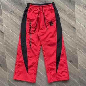 2024SS Haftowane spodnie dresowe 1 Wysokiej jakości czerwonych dużych mężczyzn Pants Kobiety joggery sznurkowe