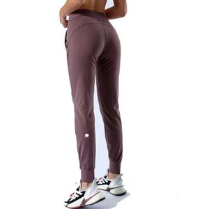"Women's Yoga Ninth Pants: High Waist Hip Lift Leggings for Fitness, Soft and Elastic Jogging Pants in 7 Vibrant Colors"