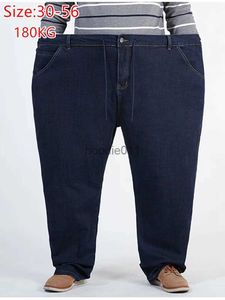 Herr jeans 180 kg plus storlek jeans män stora 56 54 52 hösten tjock rak hög midja pappa elastiska denimbyxor blå lösa sträckta byxor l231220