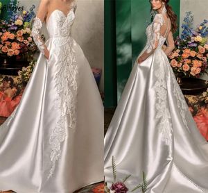 Vestidos de noiva de cetim elegante de marfim uma linha de bordados de renda com miçangas de pescoço de pescoço longo Boho vestidos de noiva com botões de bolso