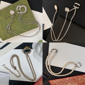 Hochwertige Designer-Halskette Marke Brief Anhänger Voguish Womens 18k Gold plattiert Silber Kupfer Herz Anhänger Perle Kette Kristall Halsketten Mode Schmuck Geschenk