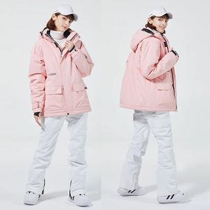 Tuta da sci Inverno Uomo Donna Tinta unita Giacca da sci da neve Caldo antivento addensato Pantaloni da snowboard Impermeabile Set da sci alpino 231220