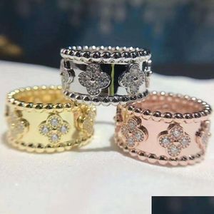 Fashion Fly-Drilled Classic Ring Wedding Cleef Rings Four-Leaf Clover Quality Luxury Stainless Steel Zircon Van Jewelry Gifts Forsa Dho7H