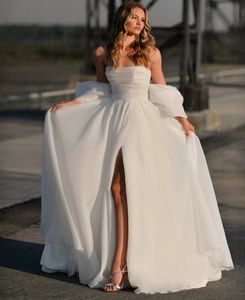 Neuankömmlinge A-Line Hochzeitskleid Frauen 2024 aus den Schulterfalten Perlen Rückenfreies Seitenschlitz Organza Brautbrautkleid Vestido de Novia